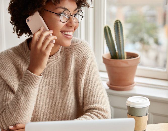 black female professional talking on the phone